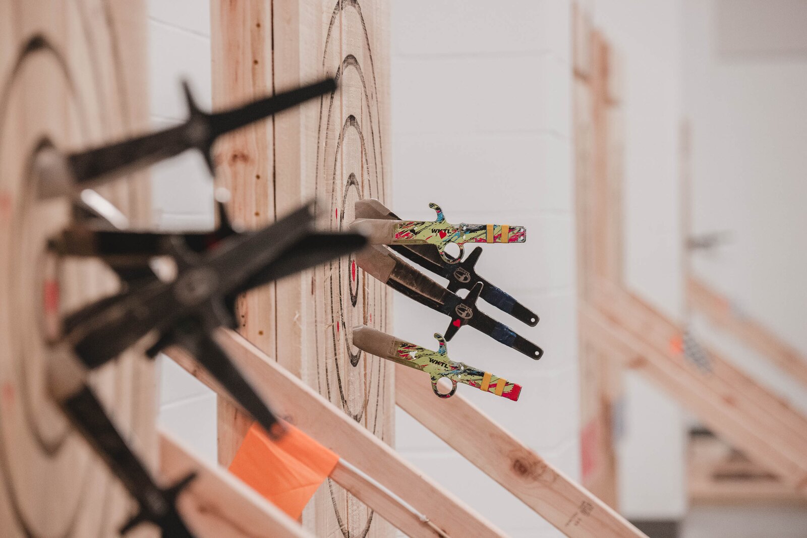 WKTL competition knives thrown into a regulation target board